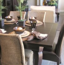dining room with leather and wicker chairs