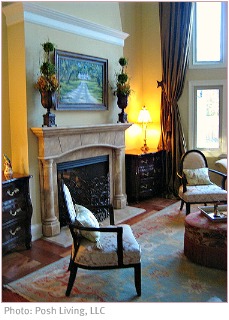 Tuscan decor fireplace and armchairs